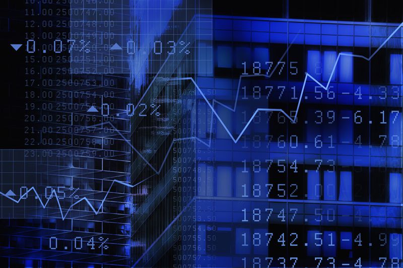 stock price percent changes and a line graph overlaid on top of a building