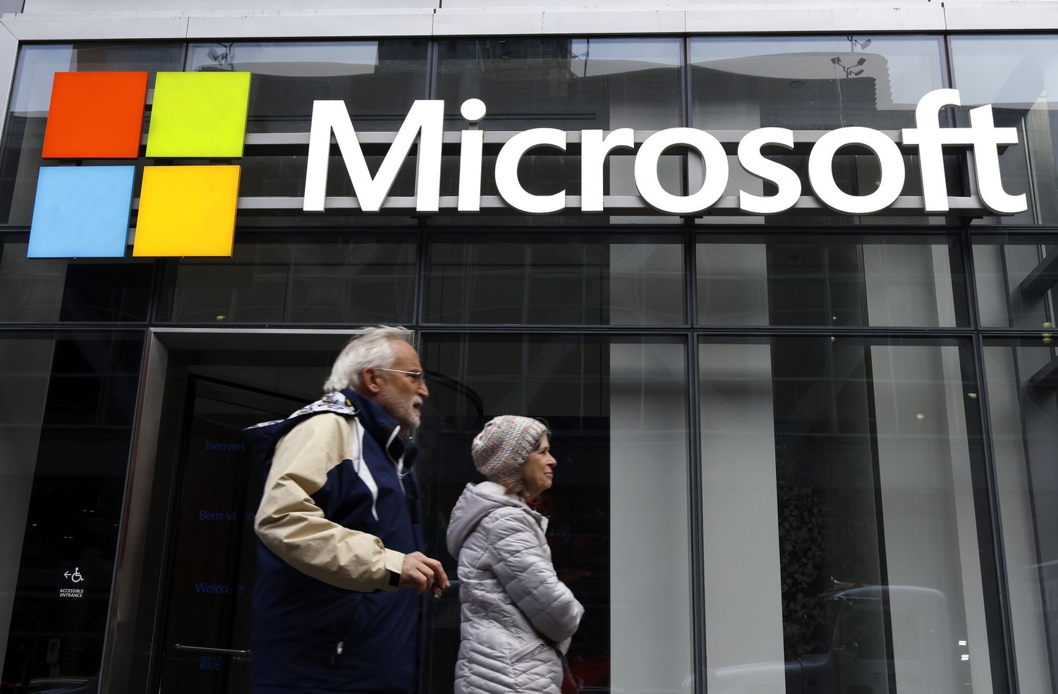 Microsoft logo displayed on their building on 8th Avenue in New York City.