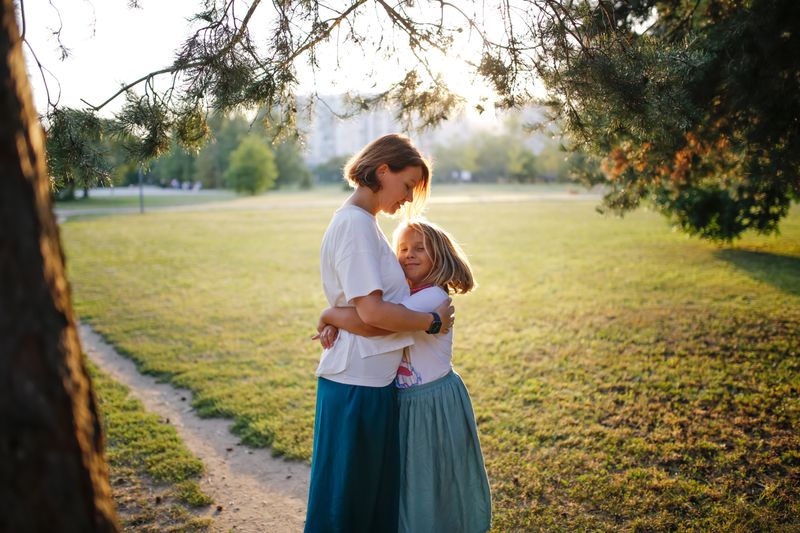mother hugging her kid
