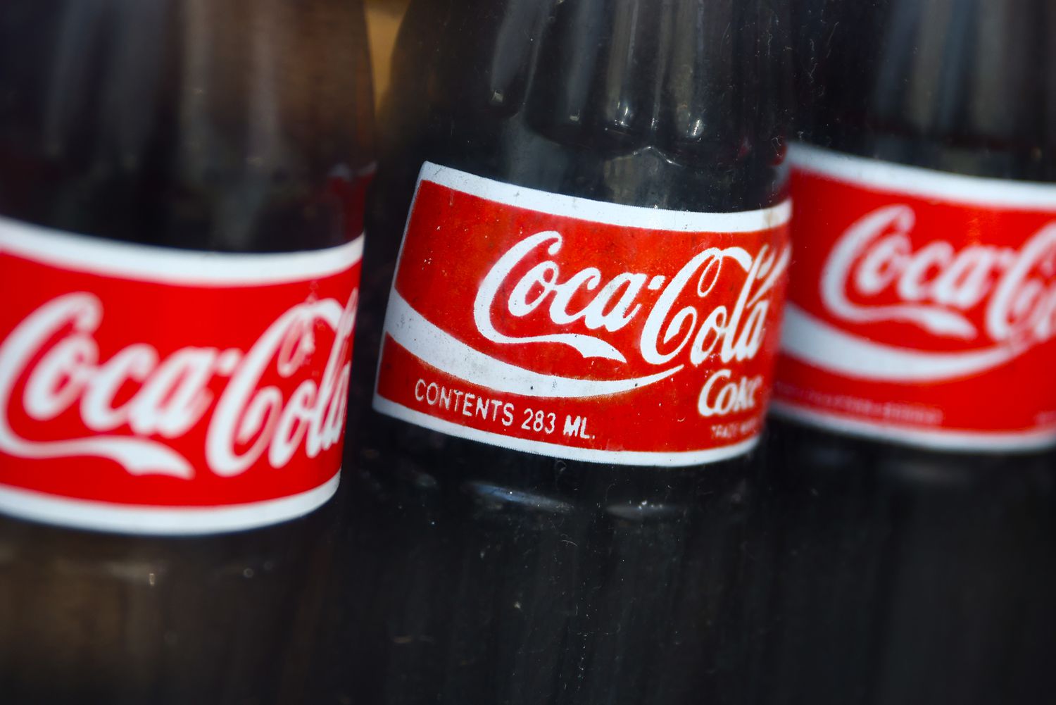 Bottles of Coca-Cola in a shop window. 
