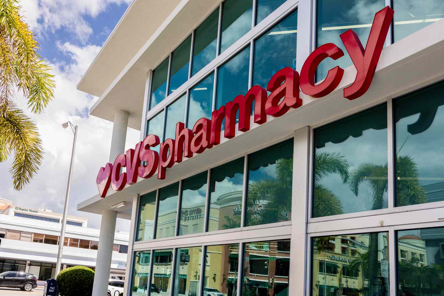 The CVS Pharmacy logo is seen on the side of a building.