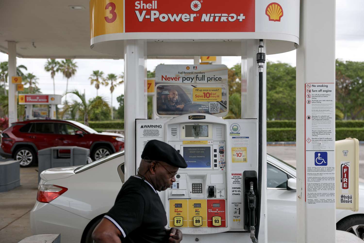 Patrick Patterson walks to his vehicle after pumping gas at a Shell station on April 10, 2025 in Miami, Florida.