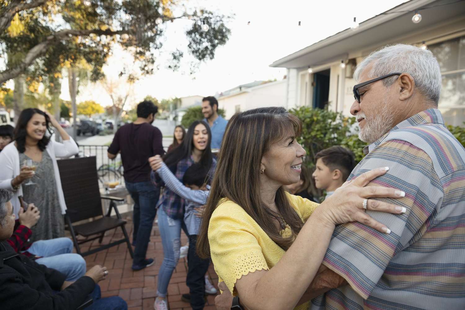 People dancing on a patio