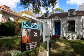 A For Sale sign displayed in front of a home on February 22, 2023 in Miami, Florida.