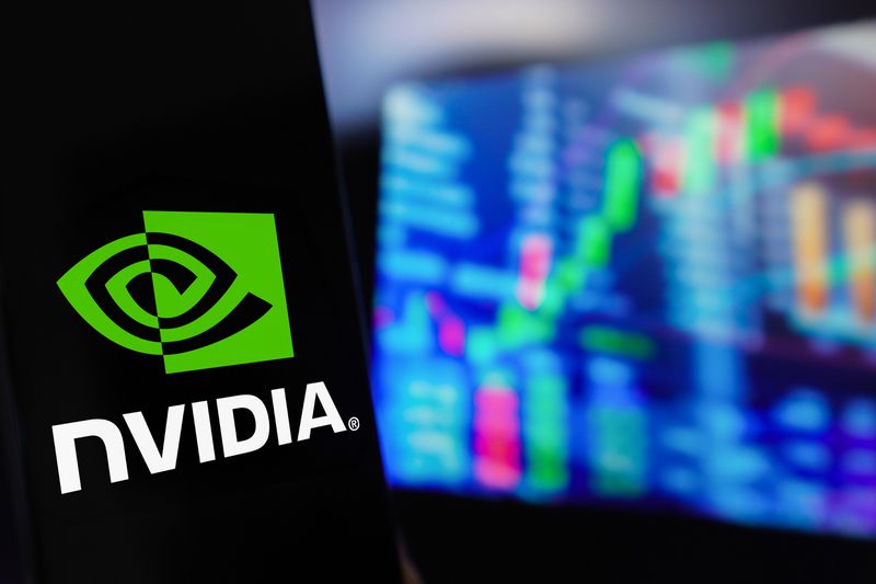 The Nvidia Corporation logo is displayed on a smartphone screen, with a graphic representation of the stock market in the background