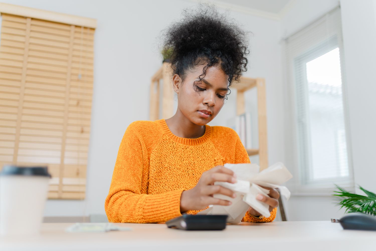 Woman researches whether direct consolidation loans are eligible for forgiveness.
