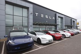 Cars on the forecourt of the Tesla dealership on the Boucher Road in Belfast. 