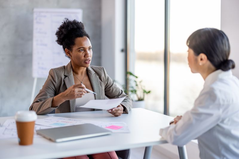 A registered financial advisor works with an accountant to review the client assets they hold and invest.