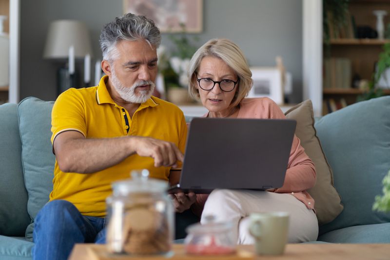 Couple looking at computer