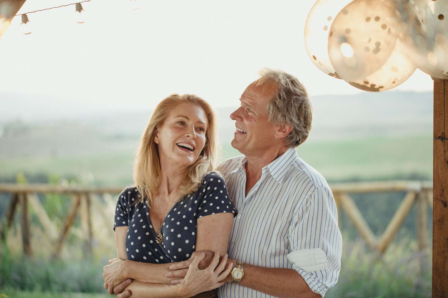 A couple dancing together, celebrating their anniversary.