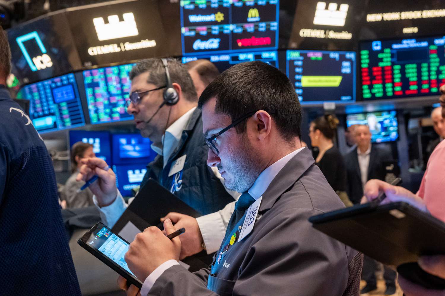 Traders work on the floor of the New York Stock Exchange.