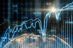 Abstract planet earth particle over the Stock market chart.