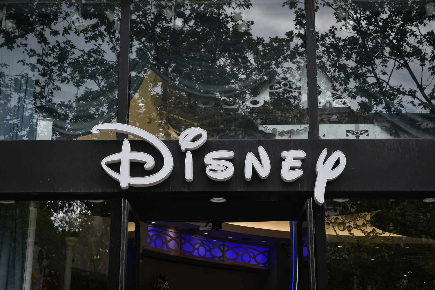 The Disney logo outside of a store.