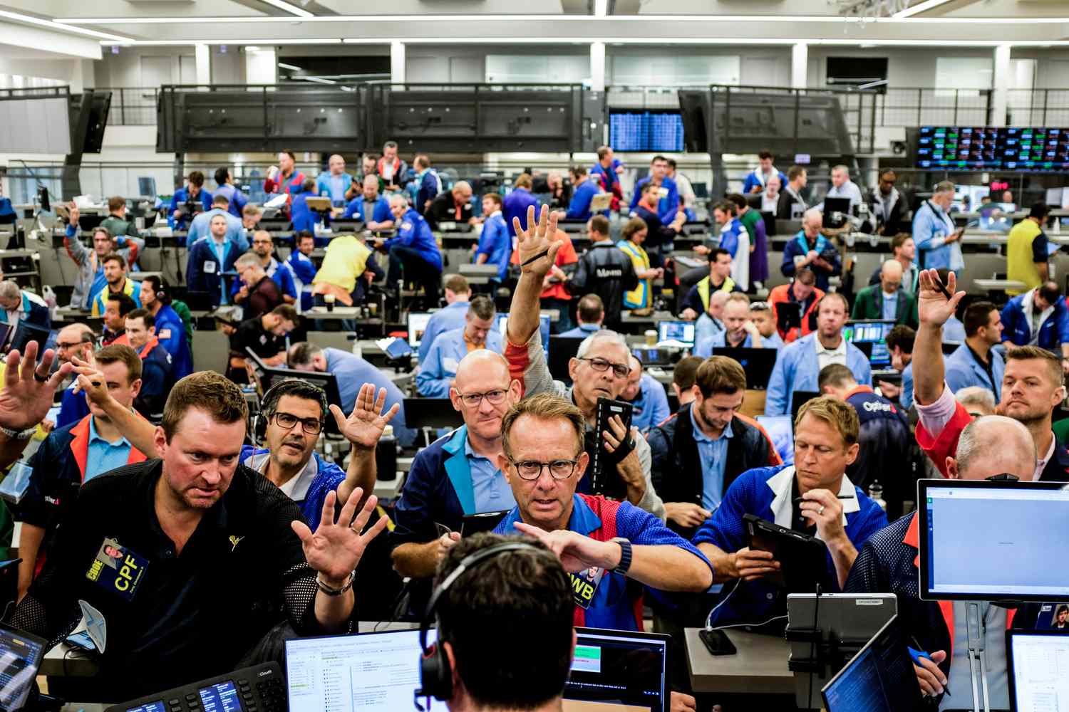 Traders work in the S&P options pit at the Cboe Global Markets exchange in Chicago, Illinois, US, on Wednesday, Aug. 28, 2024.