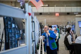 Traders on the floor of the American Stock Exchange (AMEX) at the New York Stock Exchange (NYSE) 