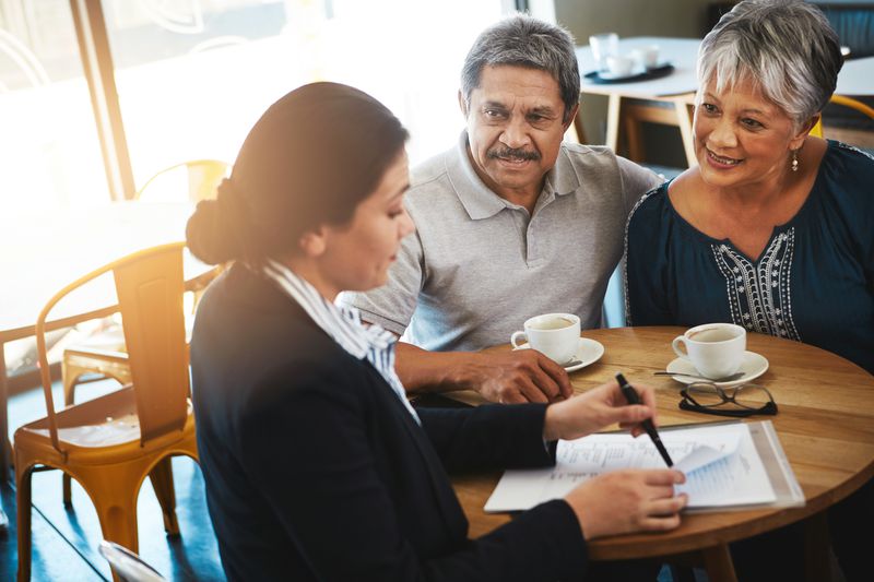 couple meeting with financial advisor