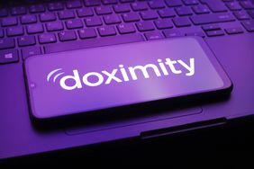 An illustration of the Doximity logo on a mobile device. 