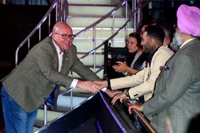 Nick Leeson shaking hands with people