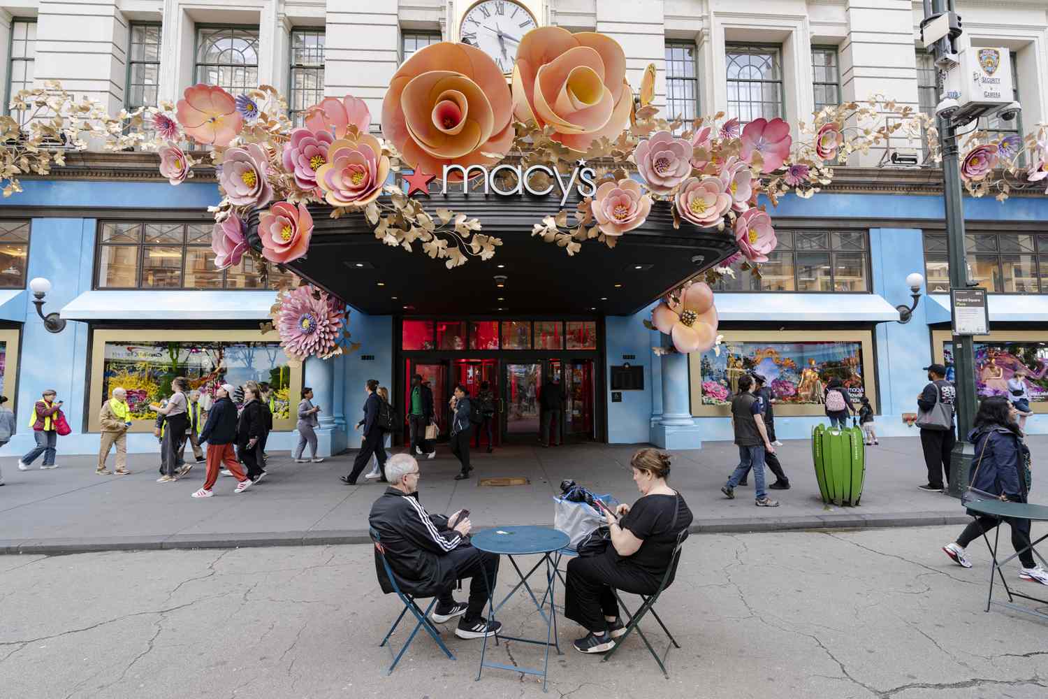 People walk past the Herald Square Macy's in Manhattan, New York