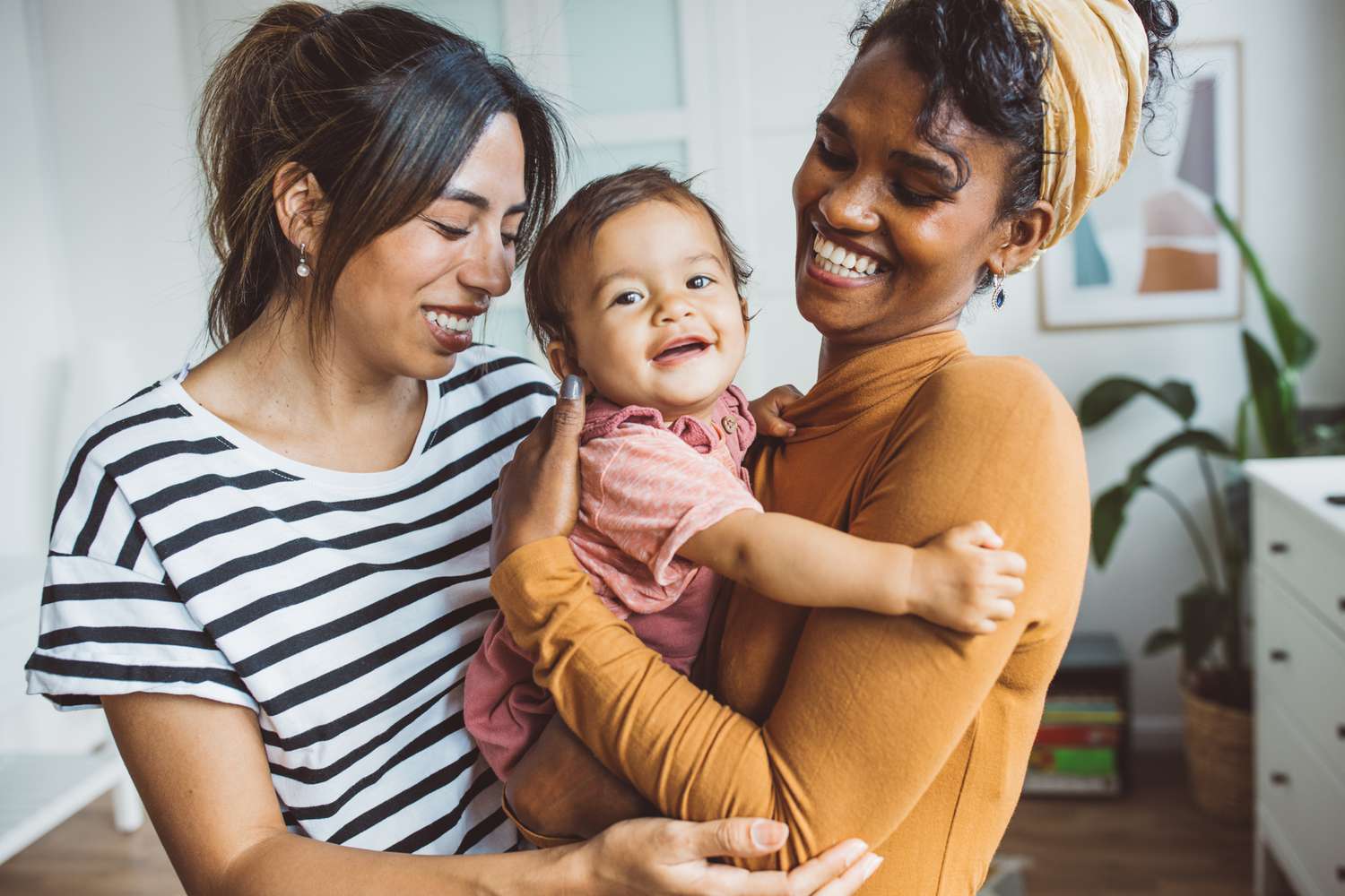 Couple with baby at home