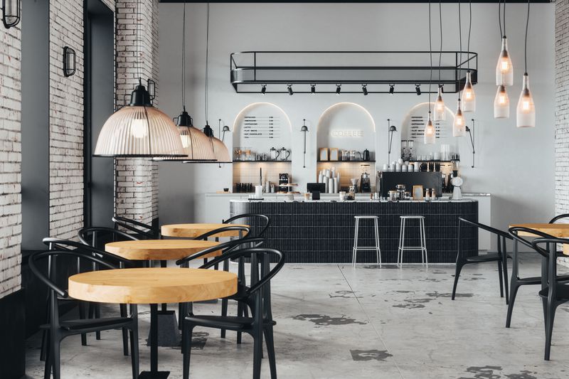 The interior of an empty coffee bar with all equipment and furnishings in place ready for rental as a turnkey business.