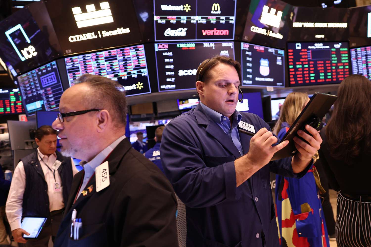 Traders work on the floor of the New York Stock Exchange during morning trading on February 03, 2025