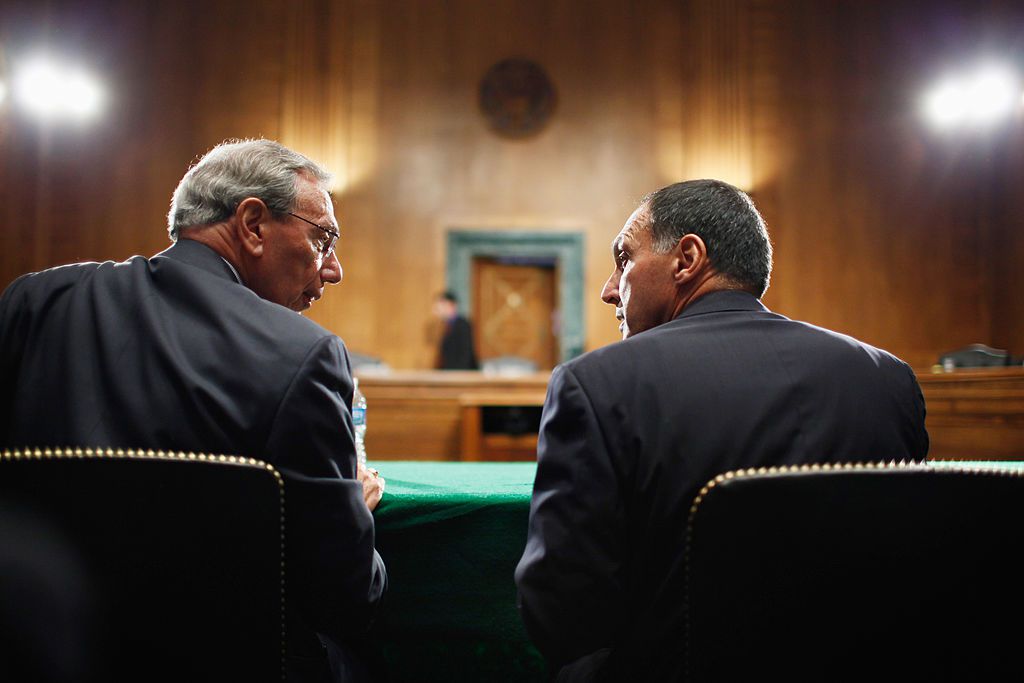 Harvey Miller talks with Lehman Brothers former Chairman and CEO Richard Fuld at a hearing about the 2008 Financial Crisis