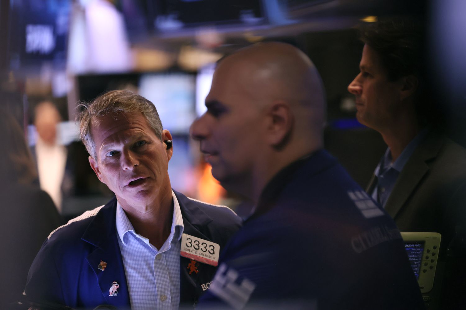 Traders work on the floor of the New York Stock Exchange