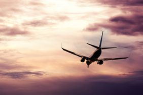 passenger jet in the sky landing