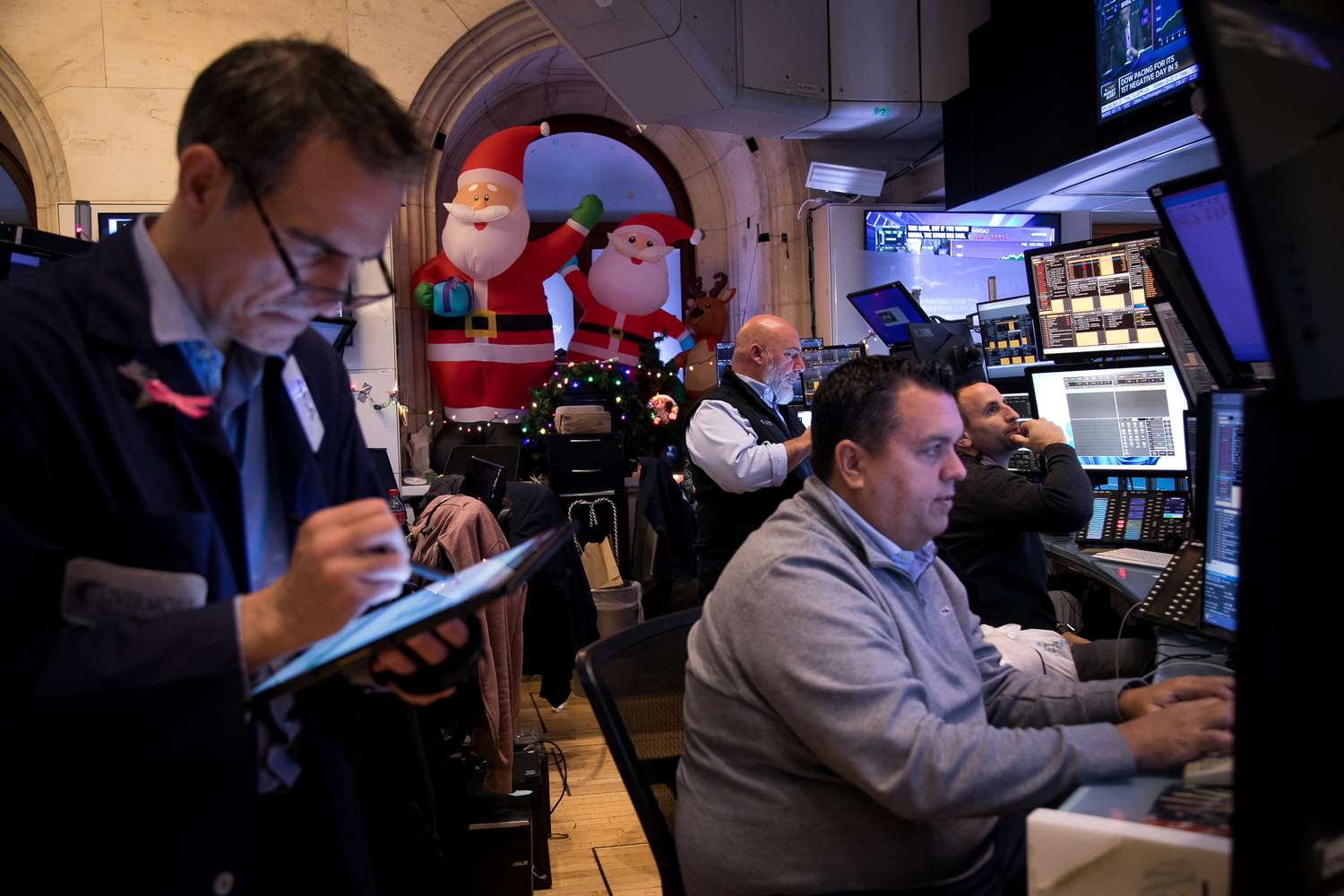 Traders work on the floor of the New York Stock Exchange (NYSE).