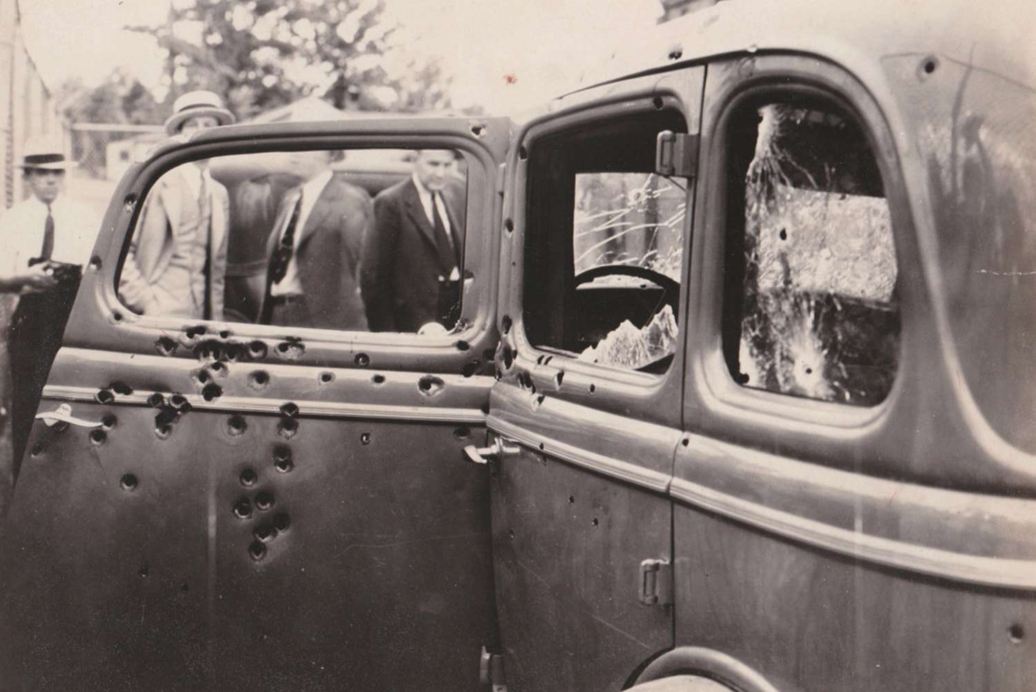 The bullet-riddled car of Bonnie Elizabeth Parker (October 1, 1910 - May 23, 1934) and Clyde Chestnut Barrow (March 24, 1909 - May 23, 1934) were an American criminal couple who travelled the central United States with their gang during the Great Depression.