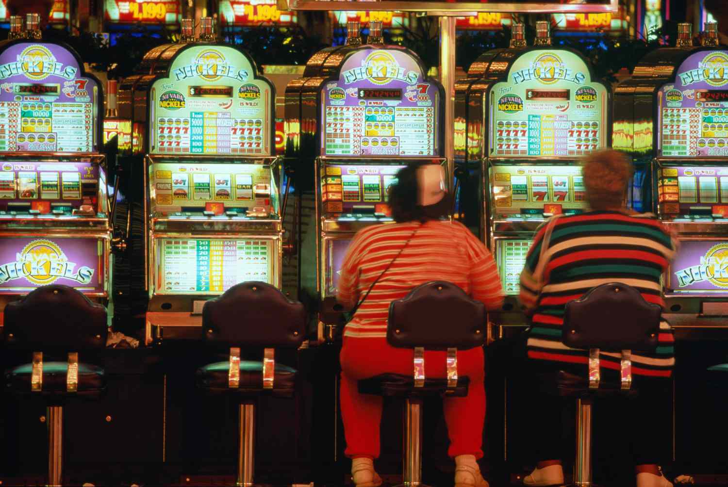 People playing slot machines at the casino in Las Vegas.