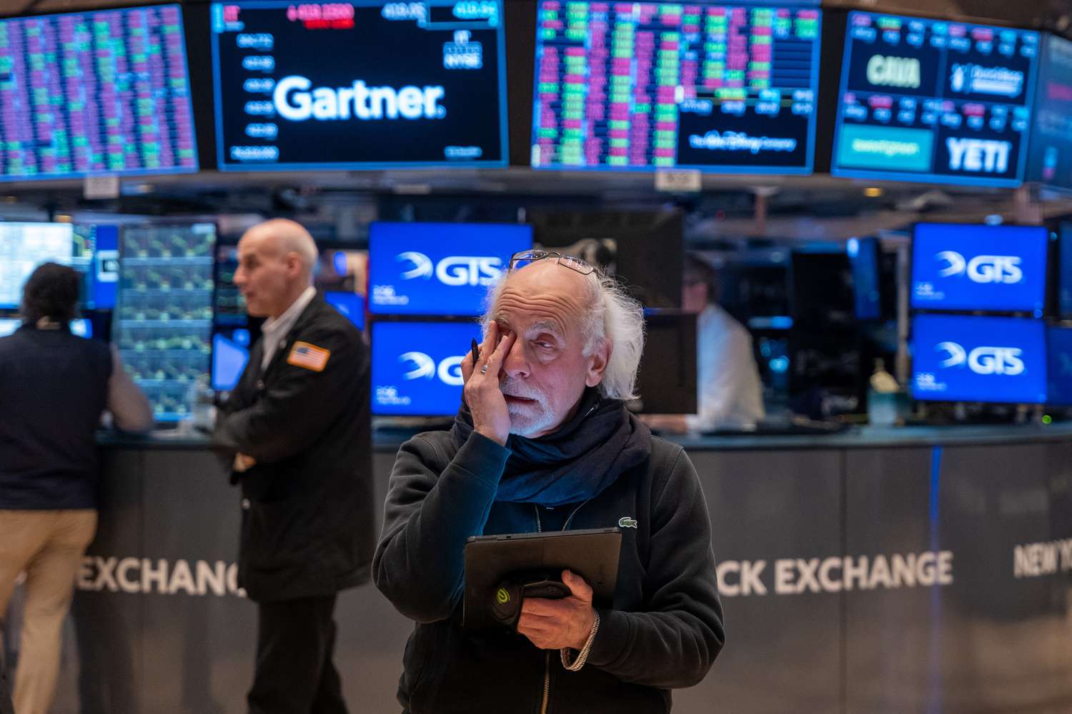 Traders work on the floor of the New York Stock Exchange.