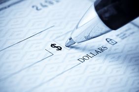 A pen and a check