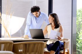 A couple discusses the results of their mutual fund.
