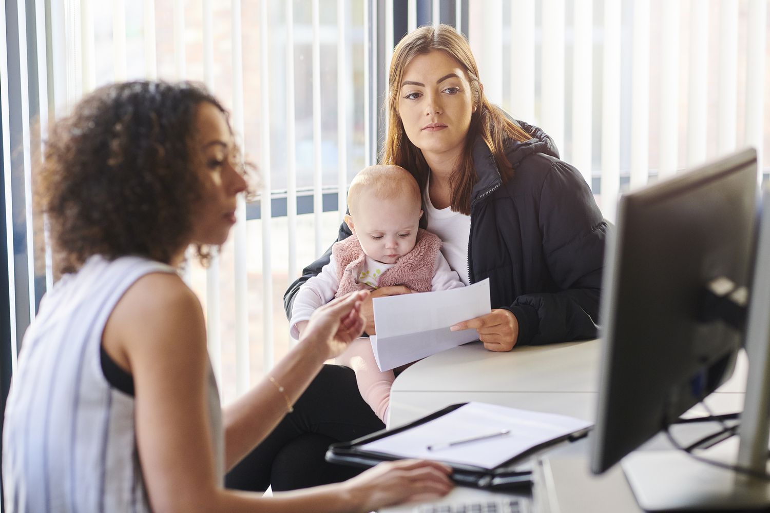 A young mother with support worker.