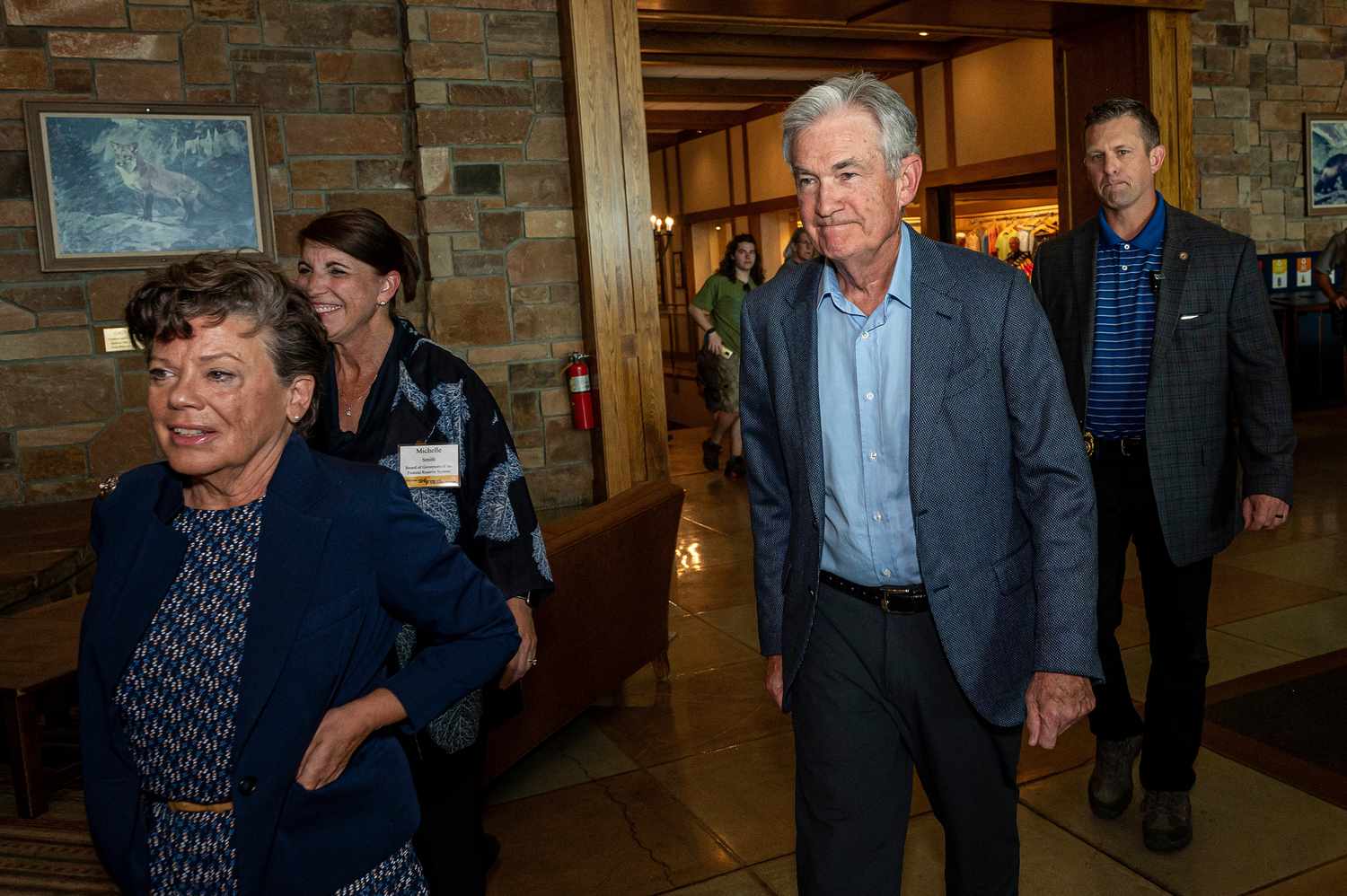 Jerome Powell, chairman of the US Federal Reserve, second right, arrives for dinner during the Jackson Hole economic symposium in Moran, Wyoming, on Thursday, Aug. 24, 2023. 