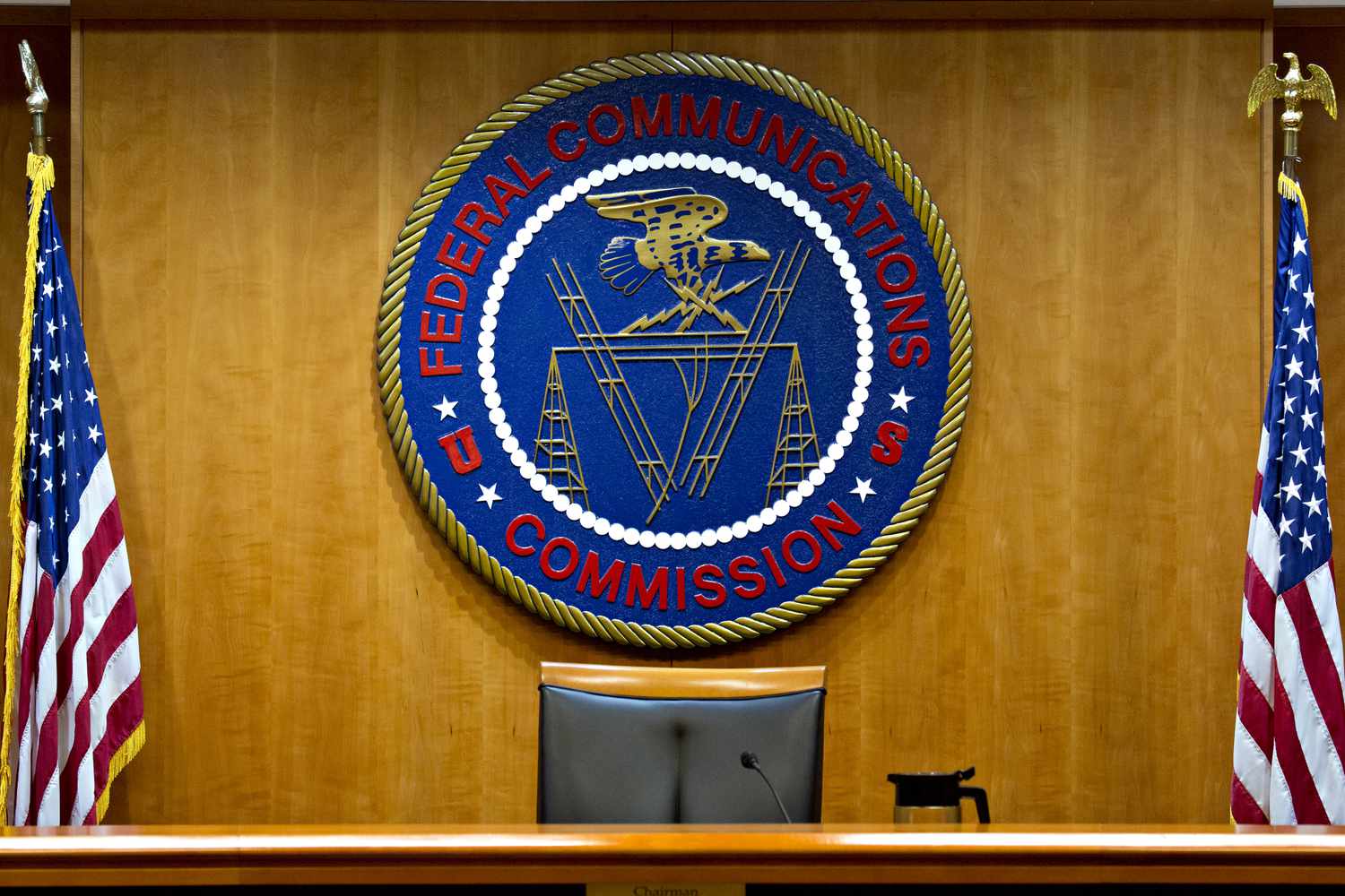 FCC logo above chair