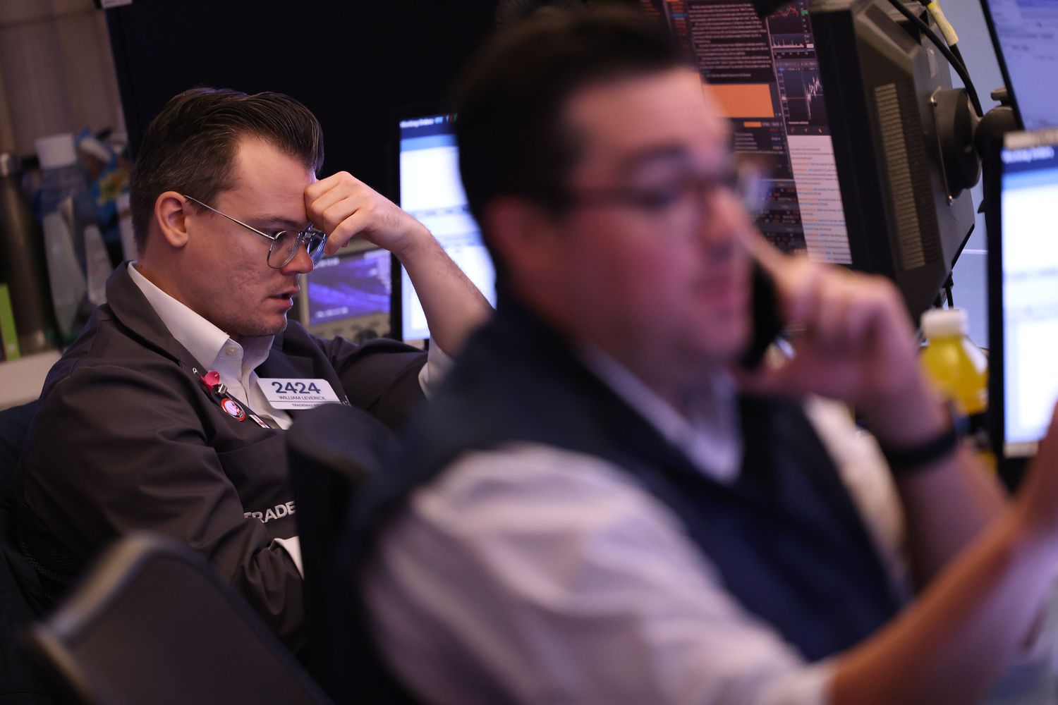 Traders work on the floor of the New York Stock Exchange