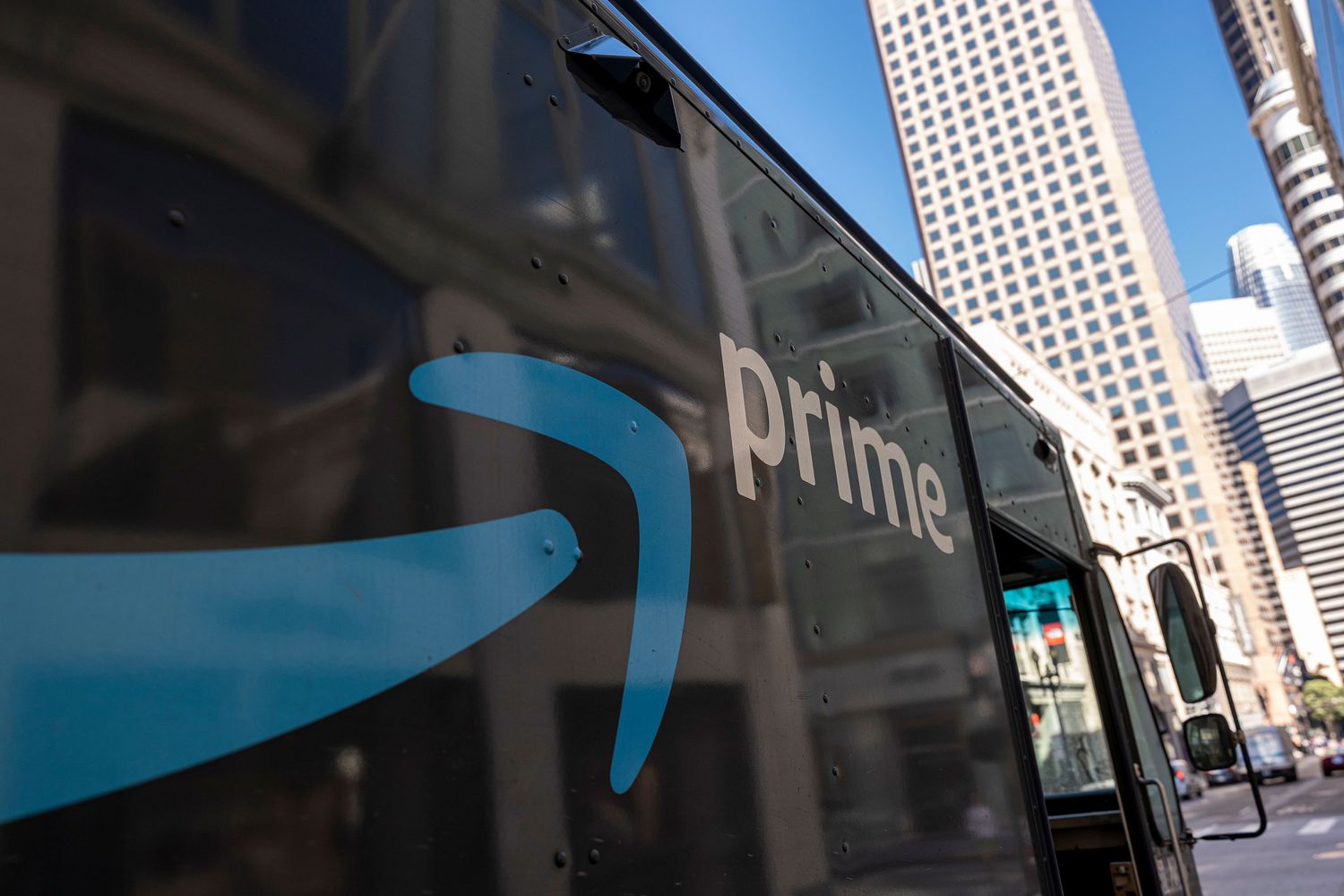 An Amazon Prime delivery truck on a city street