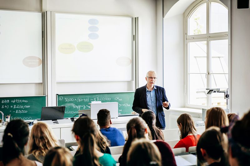 University Lecturer Addressing His Students