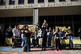 Protestors participate in the "Rally to Defend Our Schools" in front of the U.S. Department of Education on March 21, 2025 in Washington, DC.