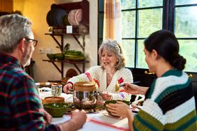 Family having a meal together in a kitchen