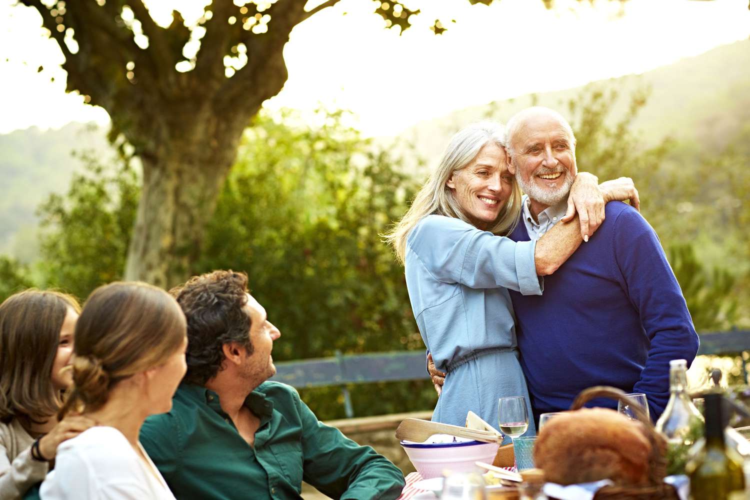 Family having a meal outdoors
