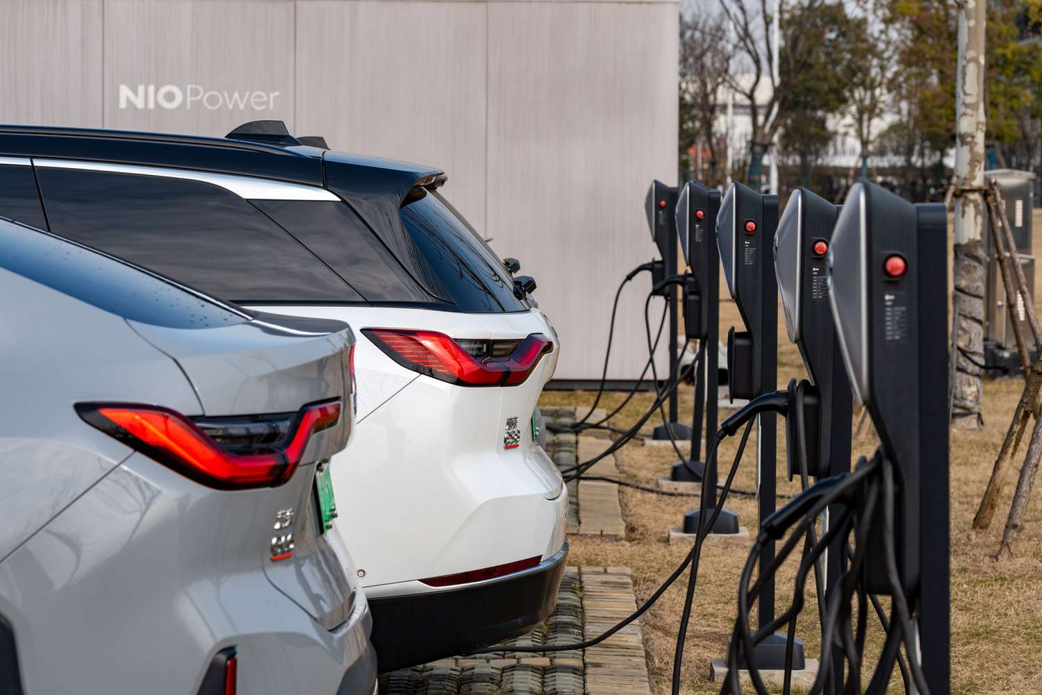 An electric vehicle charging station and EVs at Nio headquarters in Heifei, China