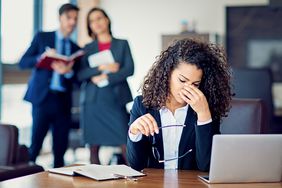 An upset woman at an office