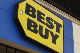 A Best Buy logo is displayed outside one of their stores