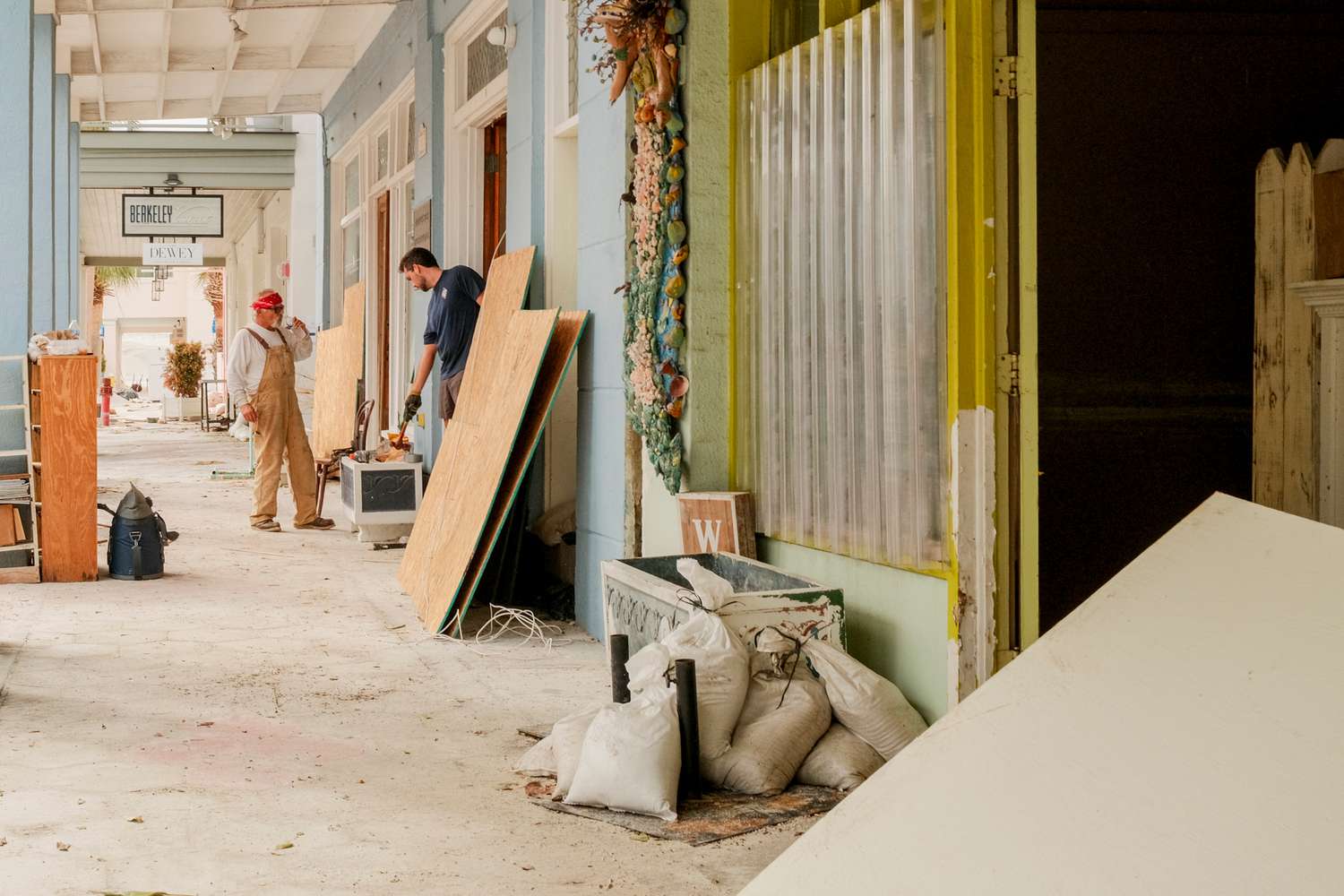 Workers clean up damage caused by hurricanes Helene and Milton in St. Pete Beach, Florida, US, on Friday, Oct. 11, 2024.