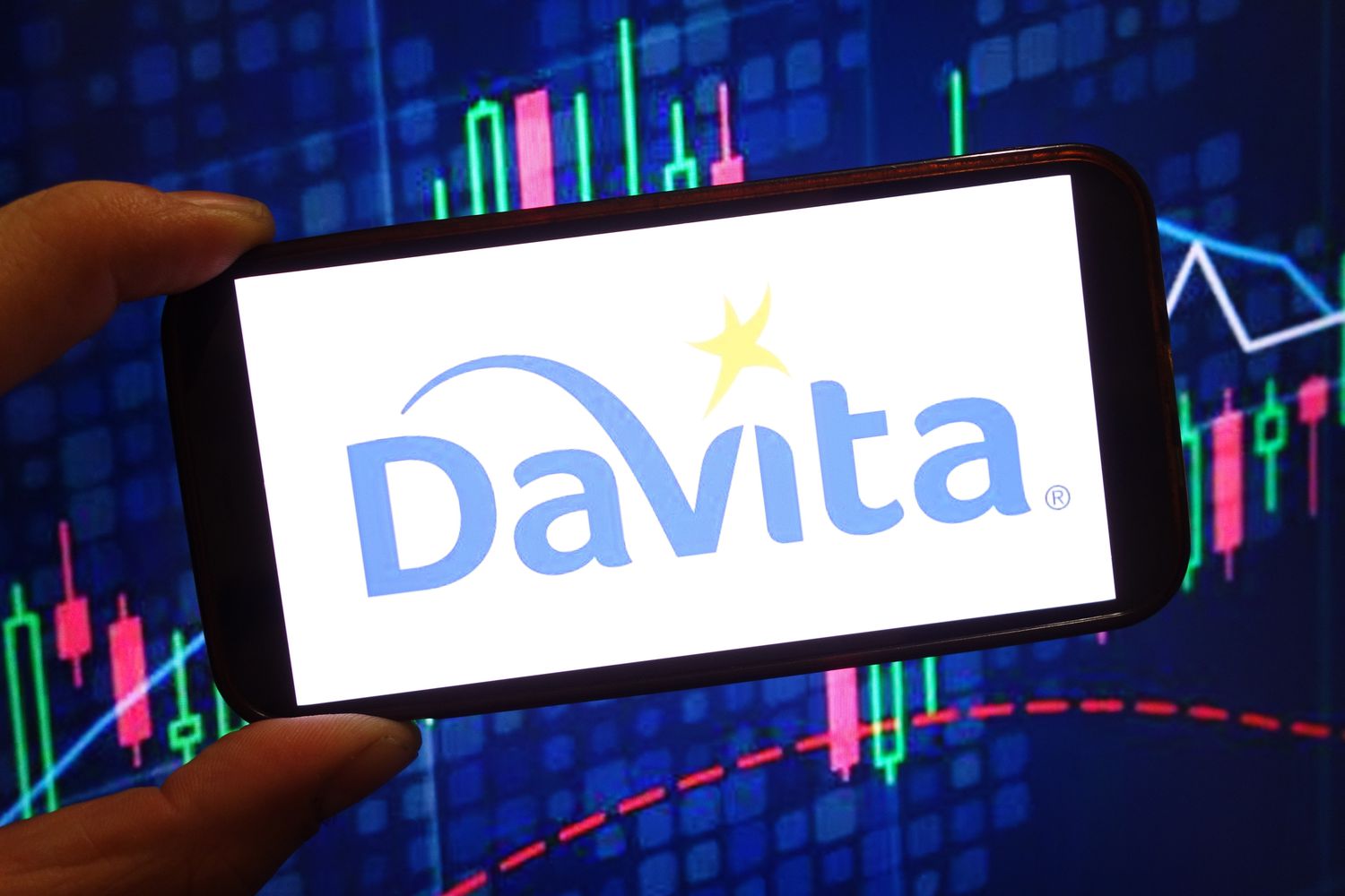 DaVita Inc company logo is seen displayed on a smartphone screen