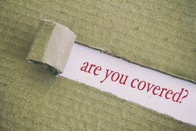 Cardboard peeled back over words "are you covered?"